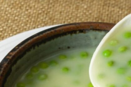 Creamy celery-pea soup puree with in a bowl